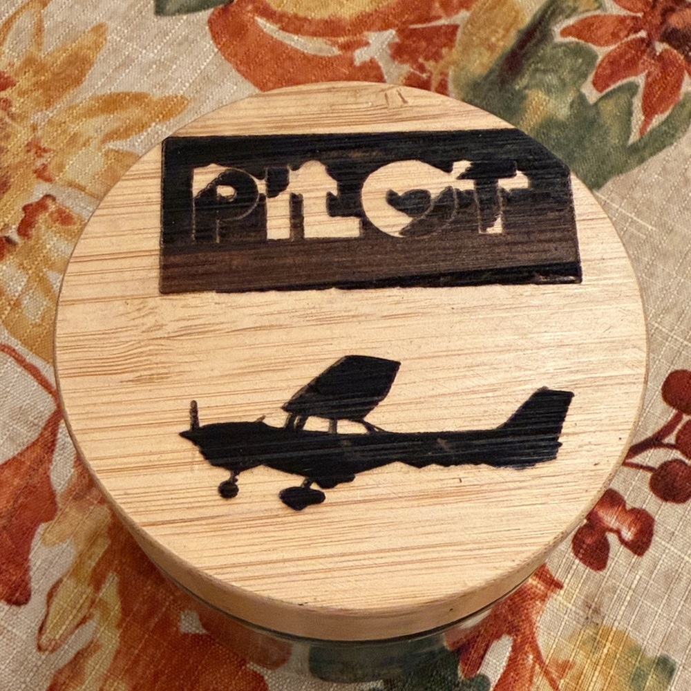 Pilot jar new burned wooden lid. Aviation. Private pilot.
